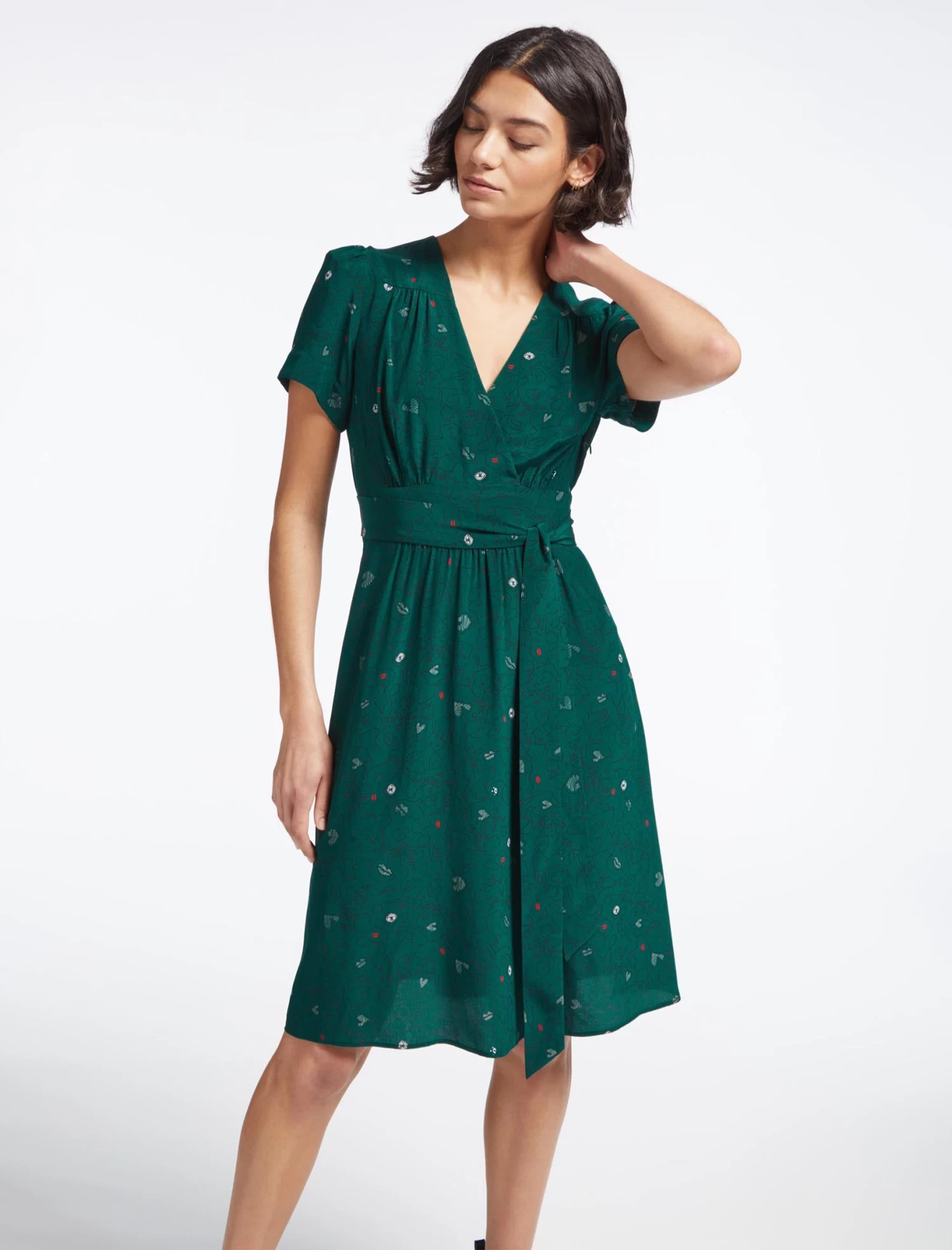 Gina Silk Knee Length Dress - Dark Green Lips Eyes Print - Image 3
